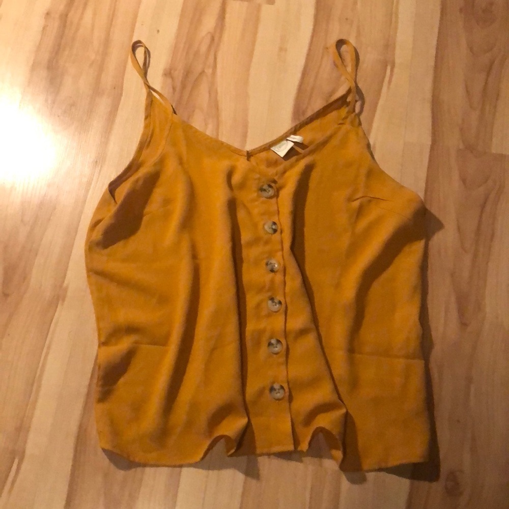 Loosely fitted short tank top.